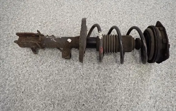 Nissan Micra Front shock absorber with coil spring