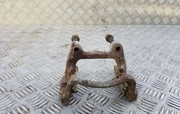 Volkswagen PASSAT B6 Brake caliper pad carrier rear 