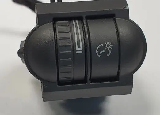 Panel lighting control switch