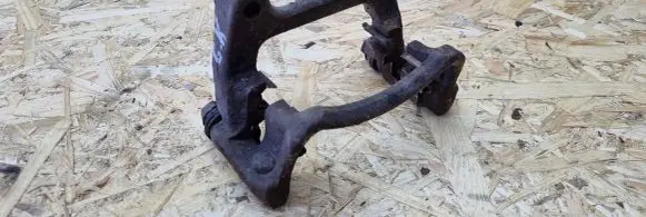 Volkswagen PASSAT B6 Brake caliper pad carrier rear 9225B