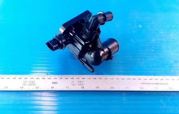 Thermostat/thermostat housing