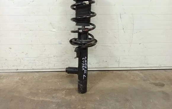 Seat Leon (5F) Front shock absorber with coil spring 5Q0413031FM