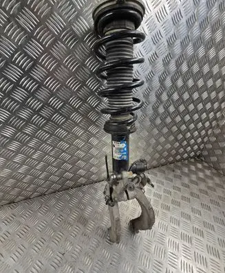 Front shock absorber with coil spring