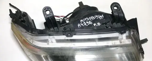 Mitsubishi Pajero Sport I Headlight/headlamp