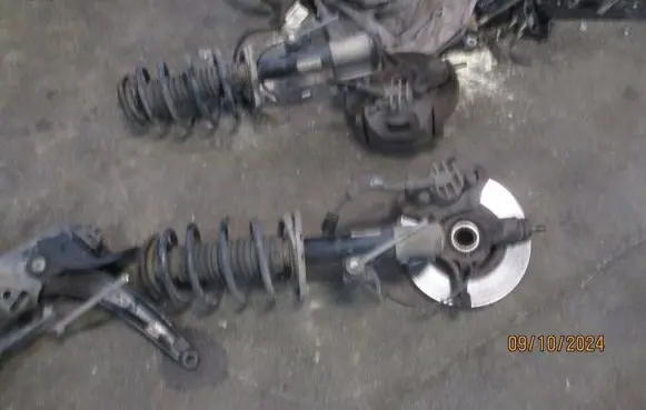 Citroen Berlingo Front shock absorber with coil spring