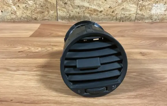 Volkswagen Caddy Dash center air vent grill 2K0819703B