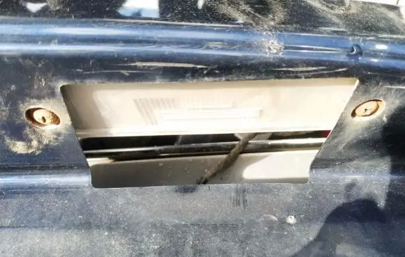 Chrysler Sebring (ST-22 - JR) Number plate light