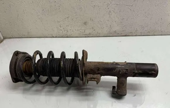 Front shock absorber with coil spring