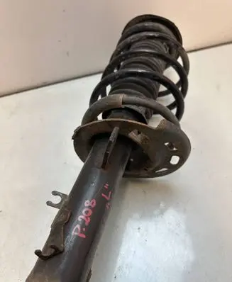 Peugeot 208 Front shock absorber with coil spring 8675465