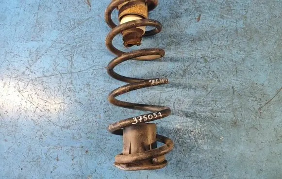 Dodge Grand Caravan Rear coil spring 4670589AA