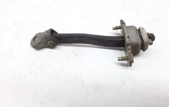 Subaru Legacy Rear door check strap stopper