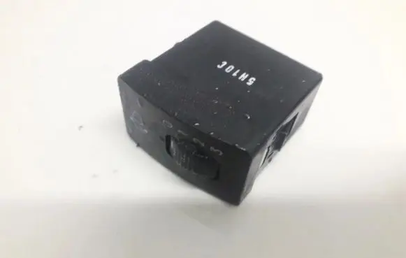 Headlight level height control switch