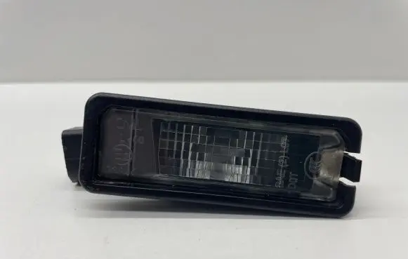 Volkswagen Golf VI Number plate light 1K8943021