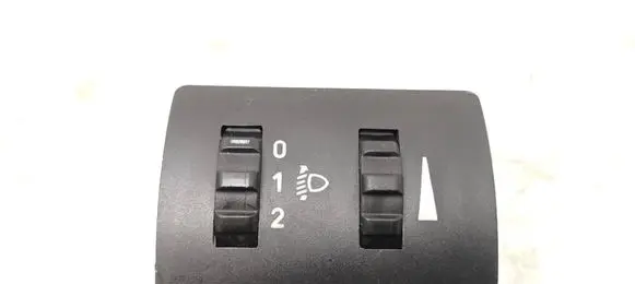 Headlight level height control switch