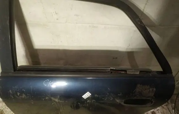 Mazda 626 Rear door glass trim molding 