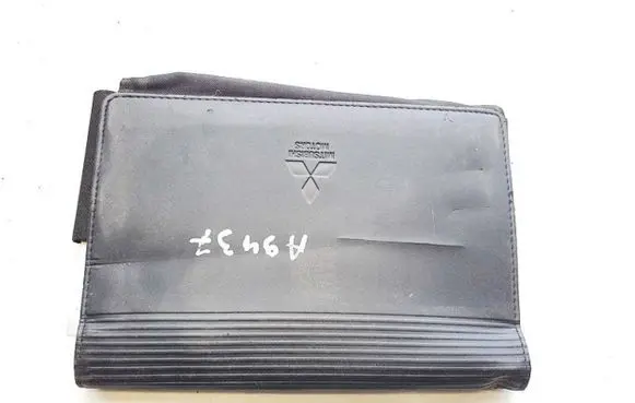 Mitsubishi Lancer Owners service history hand book 