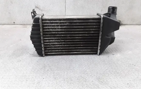 Opel Zafira B Intercooler radiator 13213402