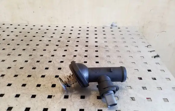 Thermostat/thermostat housing