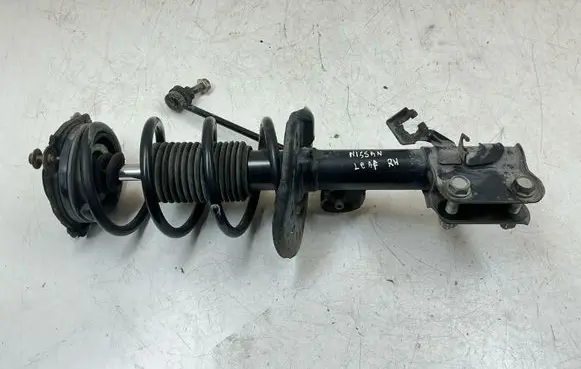 Nissan Leaf I (ZE0) Front shock absorber with coil spring 543023NF1A E43023NF1A