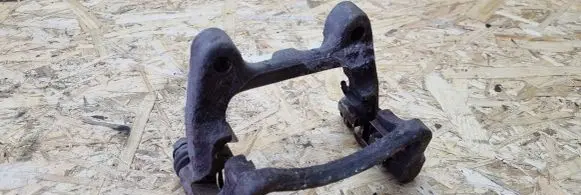 Volkswagen PASSAT B6 Brake caliper pad carrier rear 9225B