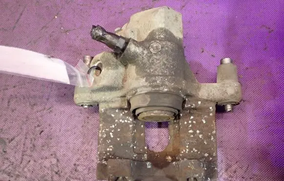 Mazda 323 F Rear brake caliper