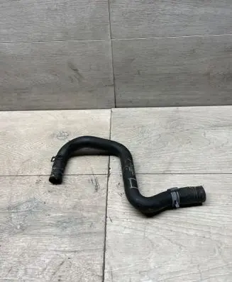 Volkswagen Golf VII Engine coolant pipe/hose 2Q0121063