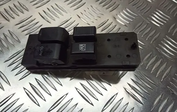Suzuki Swift I Front door window switch trim 