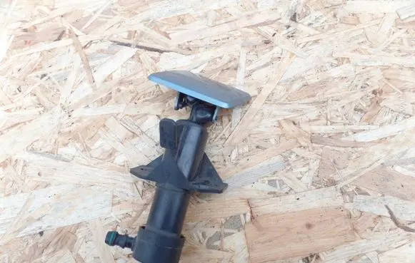 Headlight washer spray nozzle