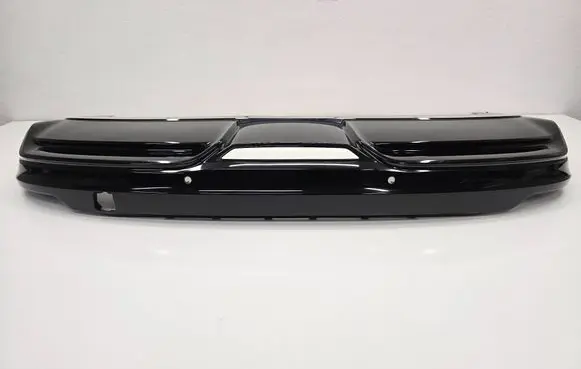 Rear bumper trim bar molding