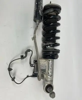 Ram 1500 Front shock absorber with coil spring 68444981AC