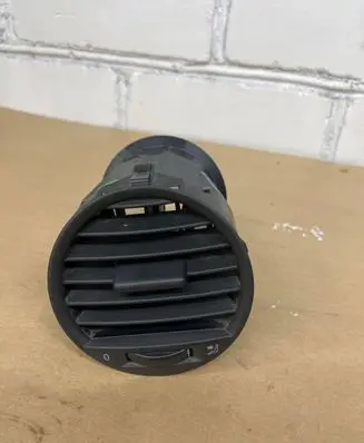 Volkswagen Caddy Dash center air vent grill 2K0819703B
