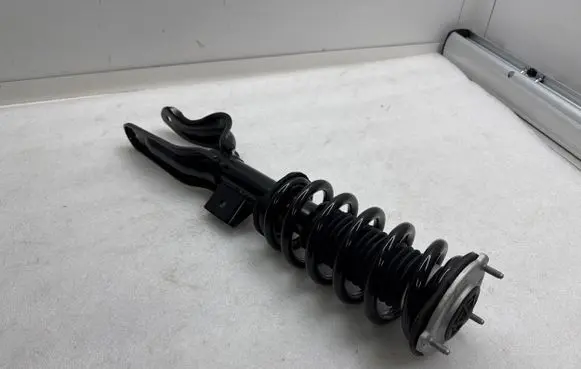 Tesla Model Y Front shock absorber with coil spring 104436800F