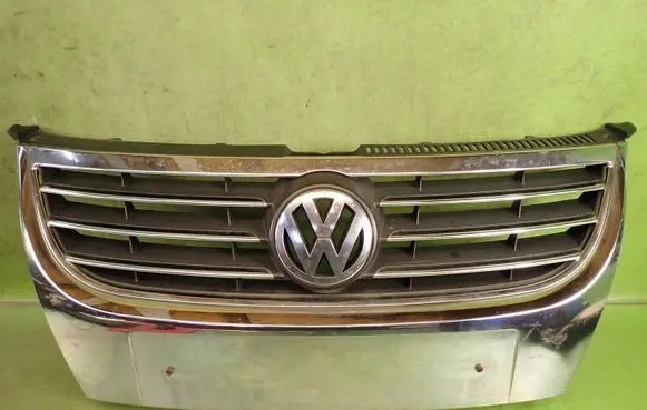 Volkswagen Touran I Front bumper upper radiator grill 1T0853651