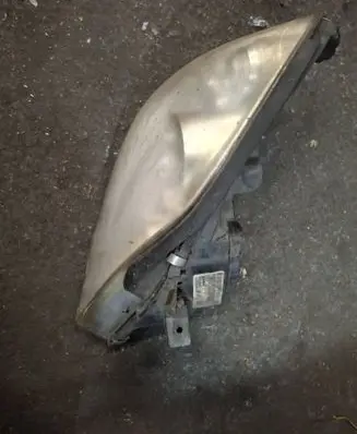 Nissan Primera Headlight/headlamp 1EJ23801002