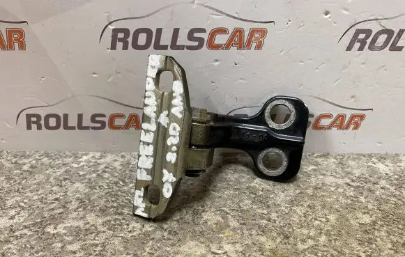 Rear door upper hinge