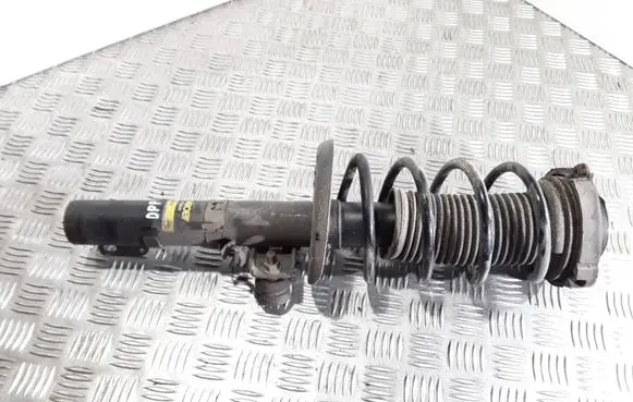 Skoda Fabia Mk2 (5J) Front shock absorber with coil spring E4997