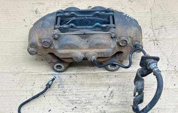 Toyota Land Cruiser (J150) Front brake caliper 4775060350