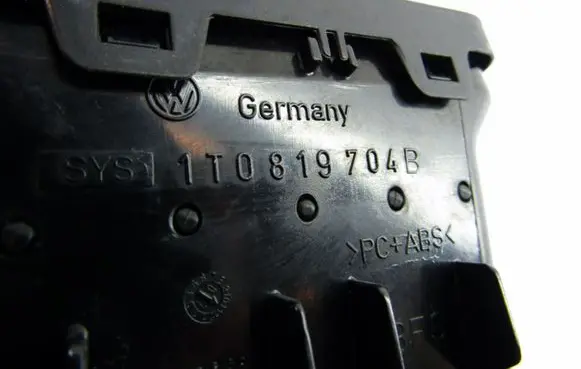 Volkswagen Touran I Dash center air vent grill 1T0819704B