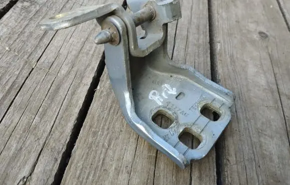 Front door lower hinge