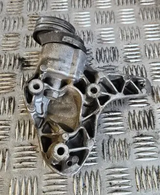 Volkswagen Golf VI A/C compressor mount bracket 1K0260885B