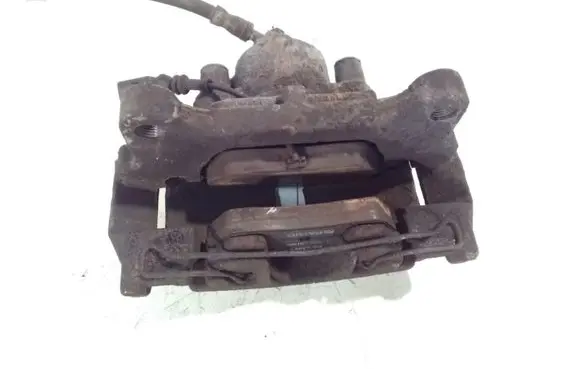 Volkswagen PASSAT B7 Front brake caliper