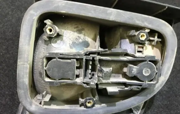 Renault Laguna I Tail light bulb cover holder