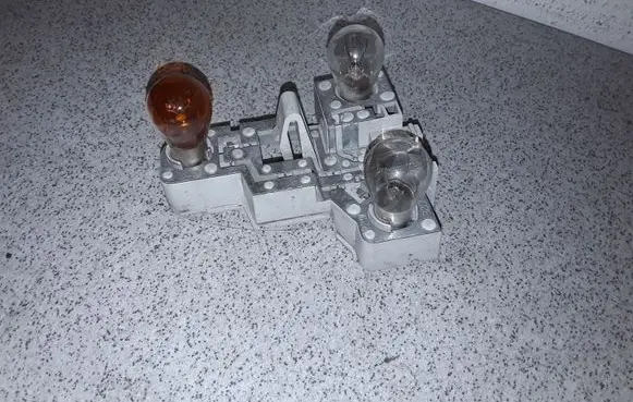 BMW 3 E46 Tail light bulb cover holder 6900471