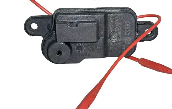 Fuel tank cap lock motor