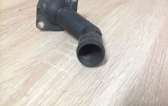 Volkswagen Golf IV Engine coolant pipe/hose 06A121128 038121121D