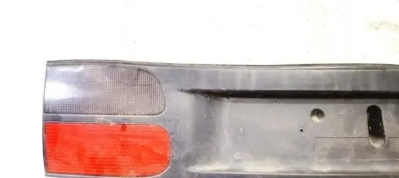 Renault Laguna I Trunk door license plate light bar 7703072198