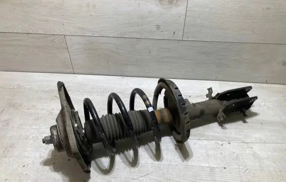 Front shock absorber with coil spring