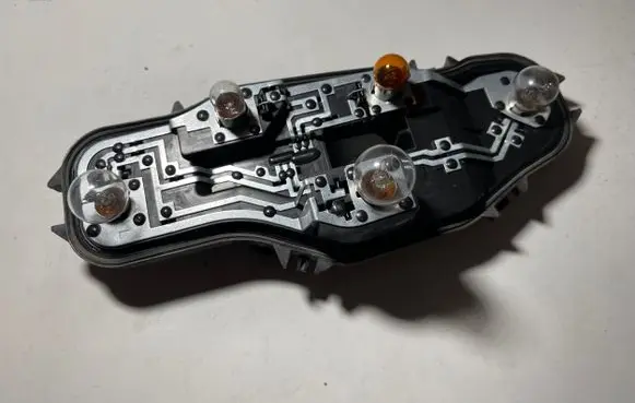 Volkswagen e-Up Tail light bulb cover holder 1S0945257
