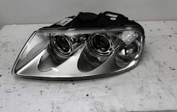 Volkswagen Touareg I Headlight/headlamp 7L6941017AP 89307855