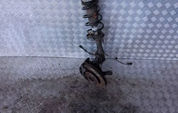 Ford Fiesta Front shock absorber with coil spring E3528201